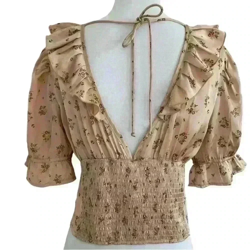 FREE PEOPLE Isabella Silky Floral Ruffle Babydoll Blouse in Copper‎ color